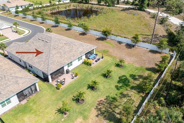 aerial view of property and surrounding area with a large body of water