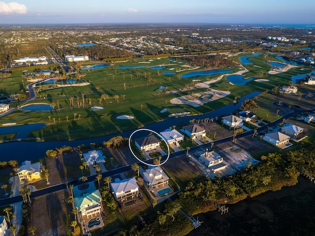 9810 Eagle Preserve Dr, Englewood, FL 34224 - aerial view with a water view and golf course view