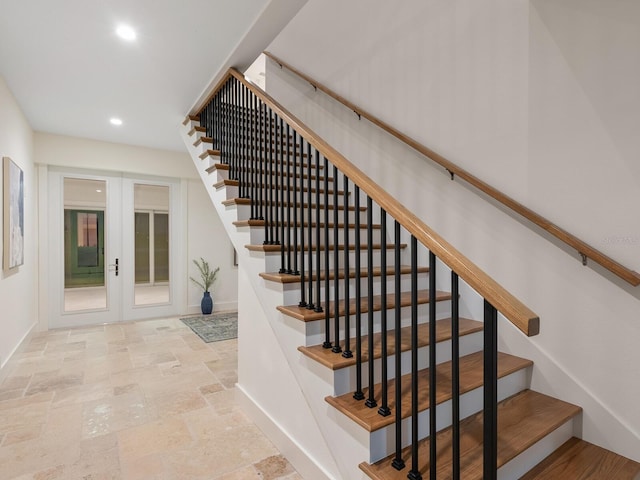 9810 Eagle Preserve Dr, Englewood, FL 34224 - stairs featuring french doors, recessed lighting, baseboards, and stone finish floor
