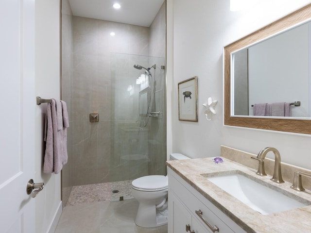 9810 Eagle Preserve Dr, Englewood, FL 34224 - bathroom featuring vanity, toilet, recessed lighting, a walk in shower, and tile patterned floors