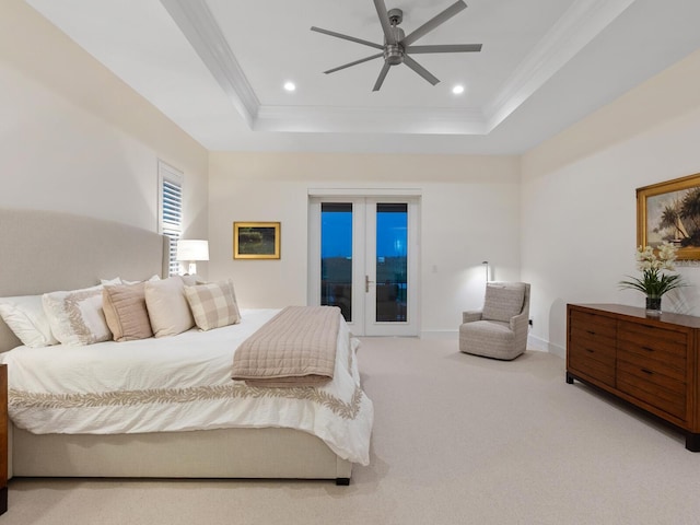 9810 Eagle Preserve Dr, Englewood, FL 34224 - carpeted bedroom featuring ornamental molding, ceiling fan, access to outside, recessed lighting, and a tray ceiling