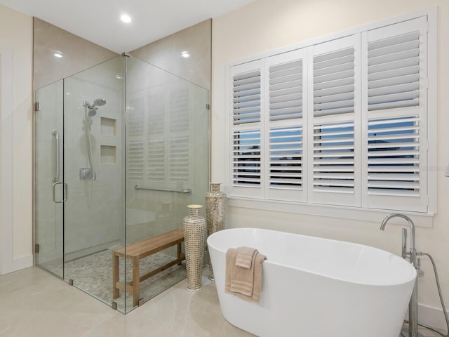 9810 Eagle Preserve Dr, Englewood, FL 34224 - full bathroom with recessed lighting, a soaking tub, and a shower stall