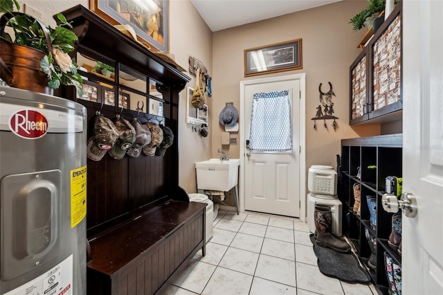 6824 283rd St E, Myakka City, FL 34251 - mudroom with light tile patterned flooring, water heater, and a sink