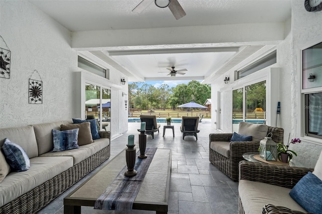 6824 283rd St E, Myakka City, FL 34251 - view of patio with a ceiling fan, outdoor lounge area, and an outdoor pool