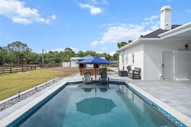 6824 283rd St E, Myakka City, FL 34251 - view of swimming pool with a patio