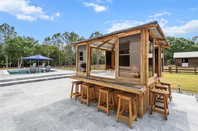 6824 283rd St E, Myakka City, FL 34251 - view of patio with an outdoor pool and fence
