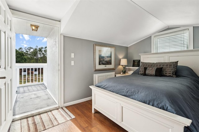 6824 283rd St E, Myakka City, FL 34251 - bedroom with access to outside, wood finished floors, lofted ceiling, baseboards, and crown molding