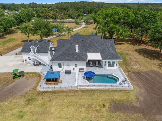 6824 283rd St E, Myakka City, FL 34251 - view from above of property with a pool area and a forest