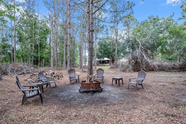 6824 283rd St E, Myakka City, FL 34251 - view of yard with an outdoor fire pit