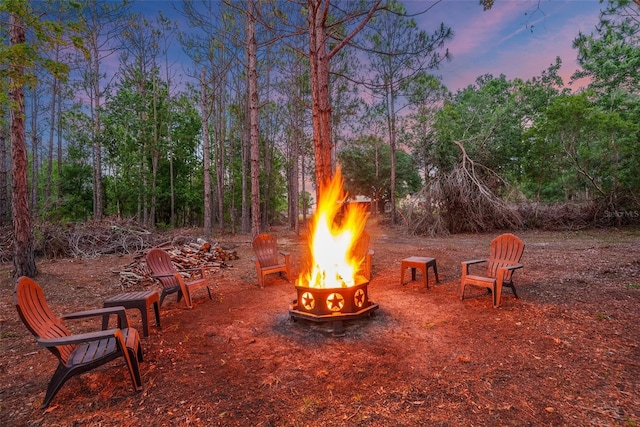 6824 283rd St E, Myakka City, FL 34251 - view of patio / terrace with an outdoor fire pit