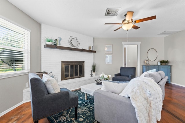 205 Cavallini Dr, Nokomis, FL 34275 - living area with baseboards, wood finished floors, visible vents, and ceiling fan