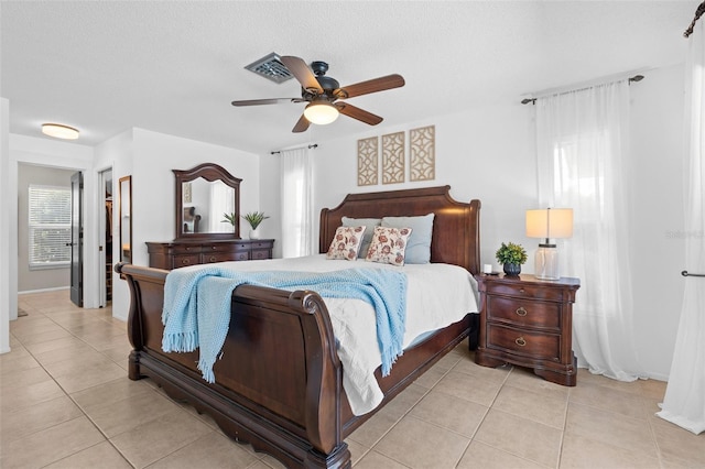 205 Cavallini Dr, Nokomis, FL 34275 - bedroom featuring ceiling fan, visible vents, and light tile patterned floors