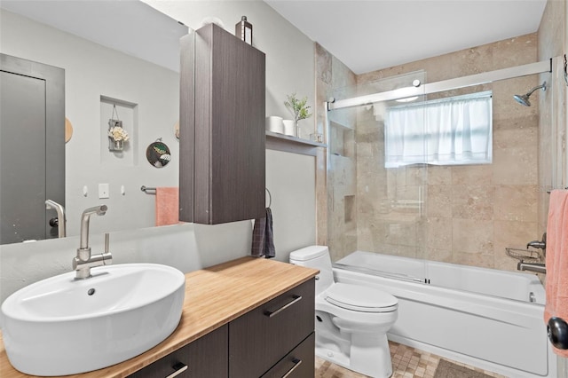 205 Cavallini Dr, Nokomis, FL 34275 - bathroom with toilet, vanity, and combined bath / shower with glass door