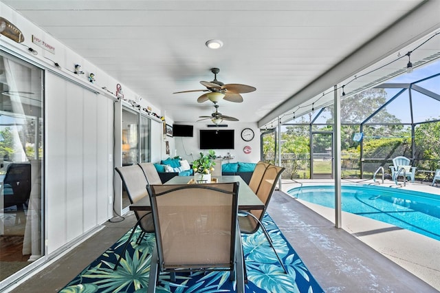 205 Cavallini Dr, Nokomis, FL 34275 - sunroom with ceiling fan and a swimming pool