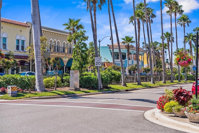 205 Cavallini Dr, Nokomis, FL 34275 - view of road with street lights, curbs, and traffic signs