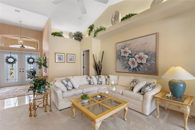 511 Governors Green Dr, Venice, FL 34293 - carpeted living area with high vaulted ceiling, a ceiling fan, french doors, and visible vents