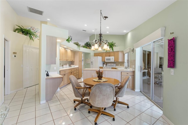 511 Governors Green Dr, Venice, FL 34293 - dining area with a chandelier, vaulted ceiling, visible vents, and light tile patterned floors