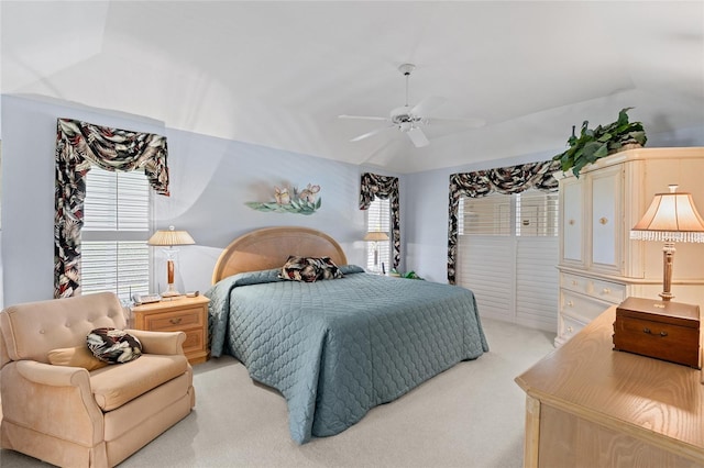 511 Governors Green Dr, Venice, FL 34293 - bedroom with vaulted ceiling, light colored carpet, and ceiling fan