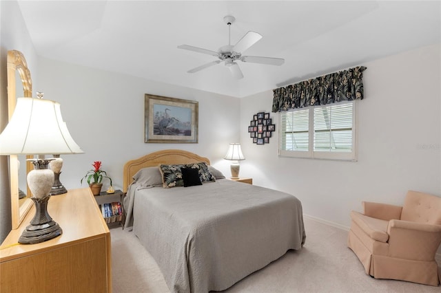 511 Governors Green Dr, Venice, FL 34293 - bedroom with light carpet, a ceiling fan, and baseboards