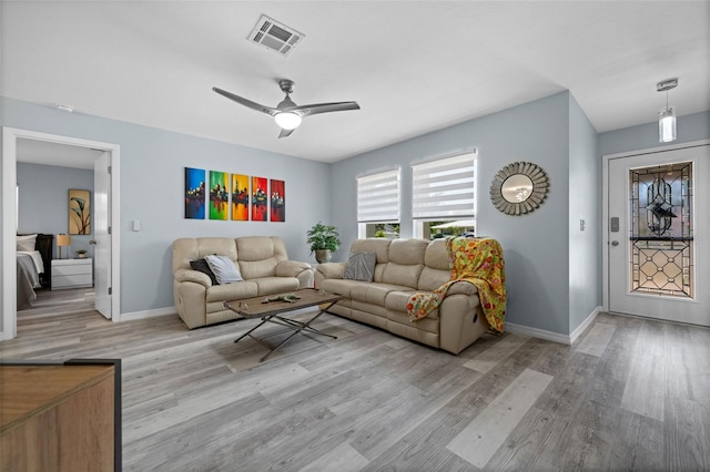 3355 Roslyn Rd, Venice, FL 34293 - living area featuring baseboards, wood finished floors, visible vents, and ceiling fan