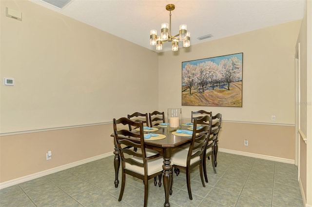 tiled dining space with baseboards, visible vents, and a notable chandelier