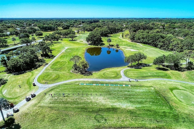 birds eye view of property featuring a water view and view of golf course