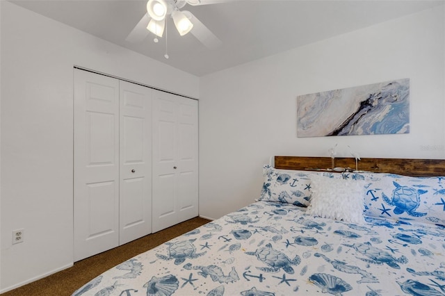 360 Base Ave E Unit 413, Venice, FL 34285 - bedroom featuring baseboards, dark carpet, a closet, and ceiling fan