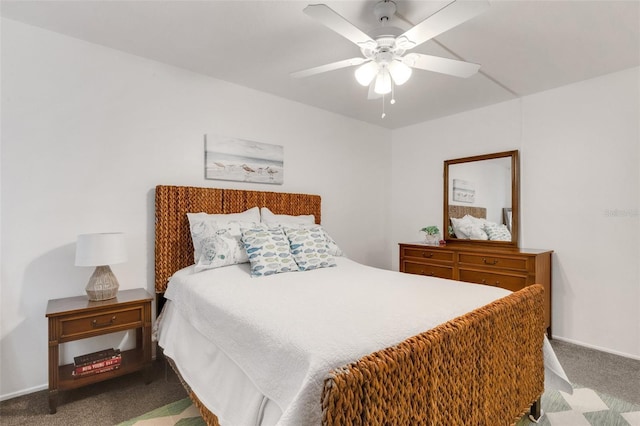 360 Base Ave E Unit 413, Venice, FL 34285 - bedroom with ceiling fan, baseboards, and carpet flooring