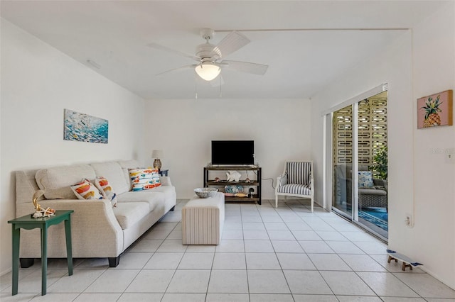 360 Base Ave E Unit 413, Venice, FL 34285 - living area with light tile patterned floors and ceiling fan