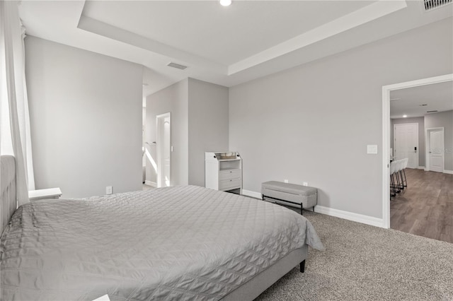 12199 Xavier Ave, Port Charlotte, FL 33981 - bedroom featuring a raised ceiling, baseboards, visible vents, and recessed lighting