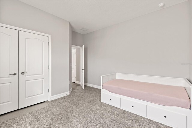 12199 Xavier Ave, Port Charlotte, FL 33981 - unfurnished bedroom featuring light carpet and baseboards