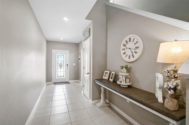 4523 Birdsong Dr, Palmetto, FL 34221 - doorway with baseboards and light tile patterned floors