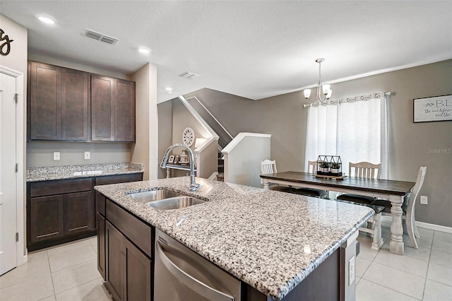 4523 Birdsong Dr, Palmetto, FL 34221 - kitchen with an inviting chandelier, dishwasher, visible vents, a sink, and light tile patterned flooring
