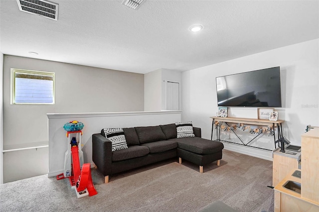 4523 Birdsong Dr, Palmetto, FL 34221 - living area with recessed lighting, a textured ceiling, carpet, and visible vents