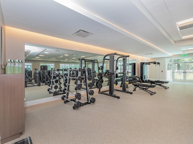 gym with french doors and visible vents