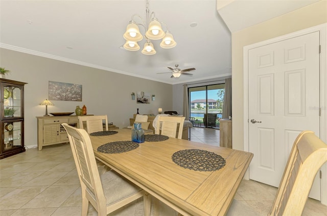 dining room with crown molding, light tile patterned flooring, baseboards, and ceiling fan with notable chandelier