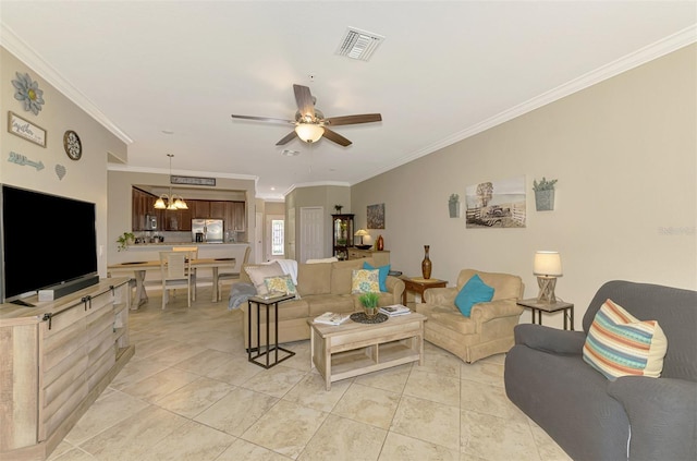 living room with visible vents, crown molding, and light tile patterned floors