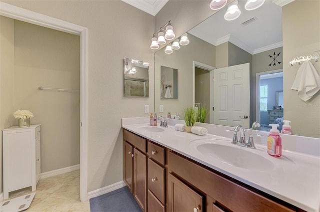 full bath featuring crown molding, a sink, and visible vents
