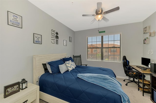 bedroom with baseboards, a ceiling fan, and light carpet