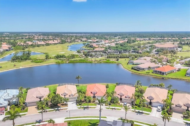 bird's eye view featuring view of golf course, a water view, and a residential view