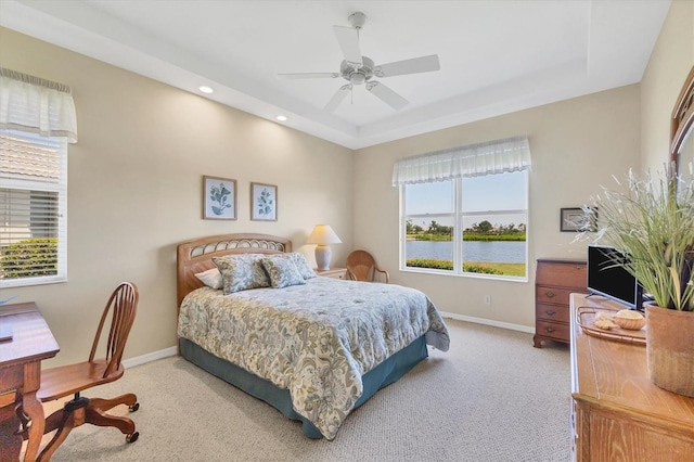 bedroom with recessed lighting, ceiling fan, baseboards, and light carpet