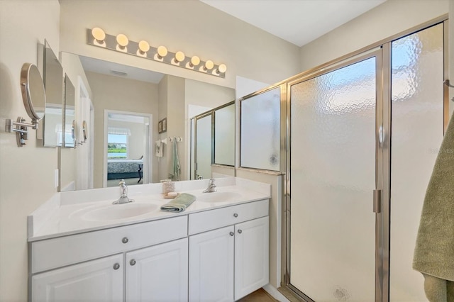 full bath featuring ensuite bath, a sink, double vanity, and a stall shower