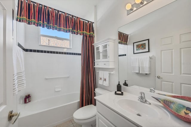 bathroom featuring shower / bath combo with shower curtain, vanity, and toilet