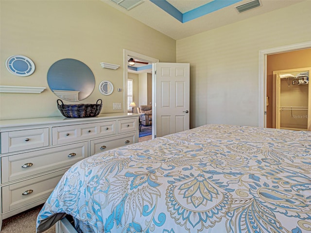 bedroom featuring visible vents
