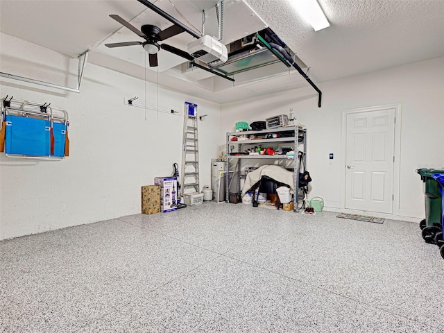 garage featuring a ceiling fan and a garage door opener