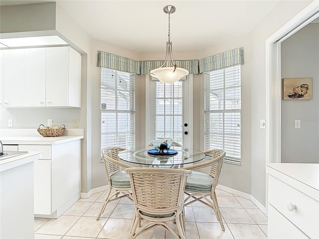 542 Clubside Cir Unit 20, Venice, FL 34293 - dining area featuring baseboards and light tile patterned floors