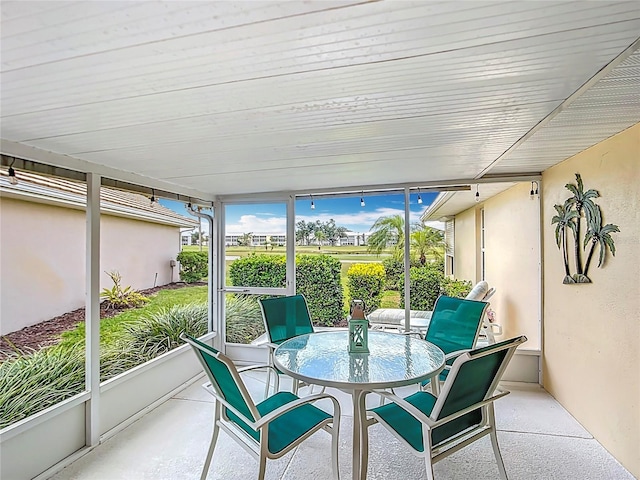 542 Clubside Cir Unit 20, Venice, FL 34293 - sunroom / solarium with outdoor dining area