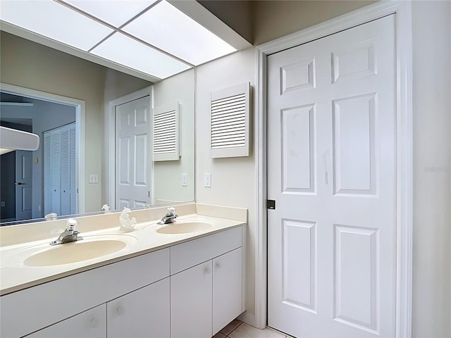 542 Clubside Cir Unit 20, Venice, FL 34293 - full bathroom with tile patterned flooring, double vanity, and a sink