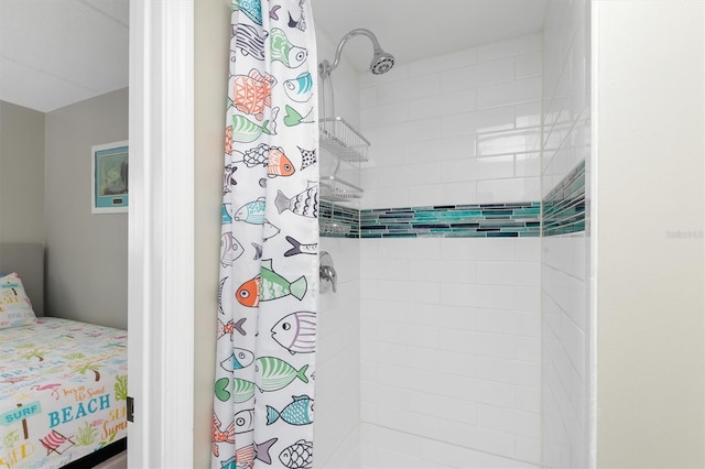 649 Tamiami Trl S Unit 106, Venice, FL 34285 - full bathroom featuring a tile shower