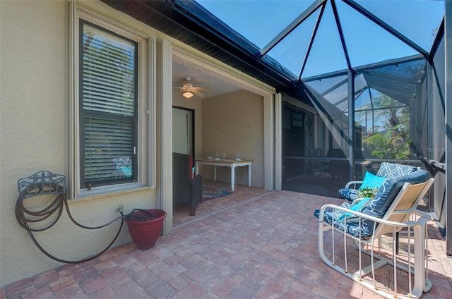 view of patio / terrace with glass enclosure